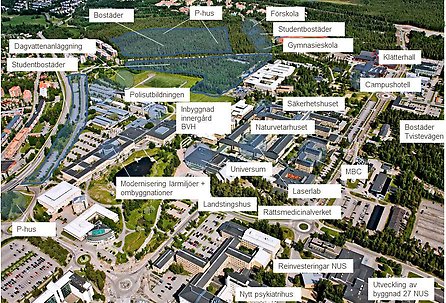 Flygfoto över universitetsstaden och planerade projekt utmarkerade.
