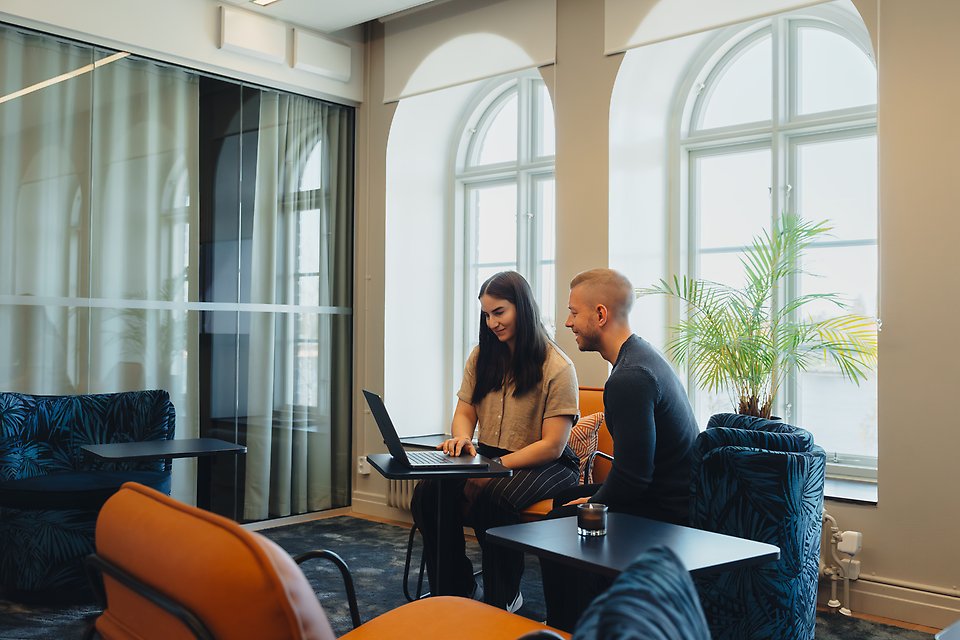 Two persons in a meeting