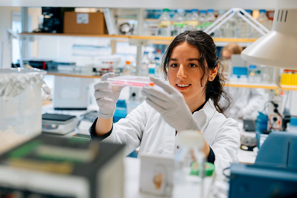 Young woman working in a lab