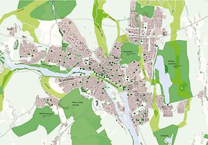 Kartillustration över Umeå med gröna oaser utmarkerade.